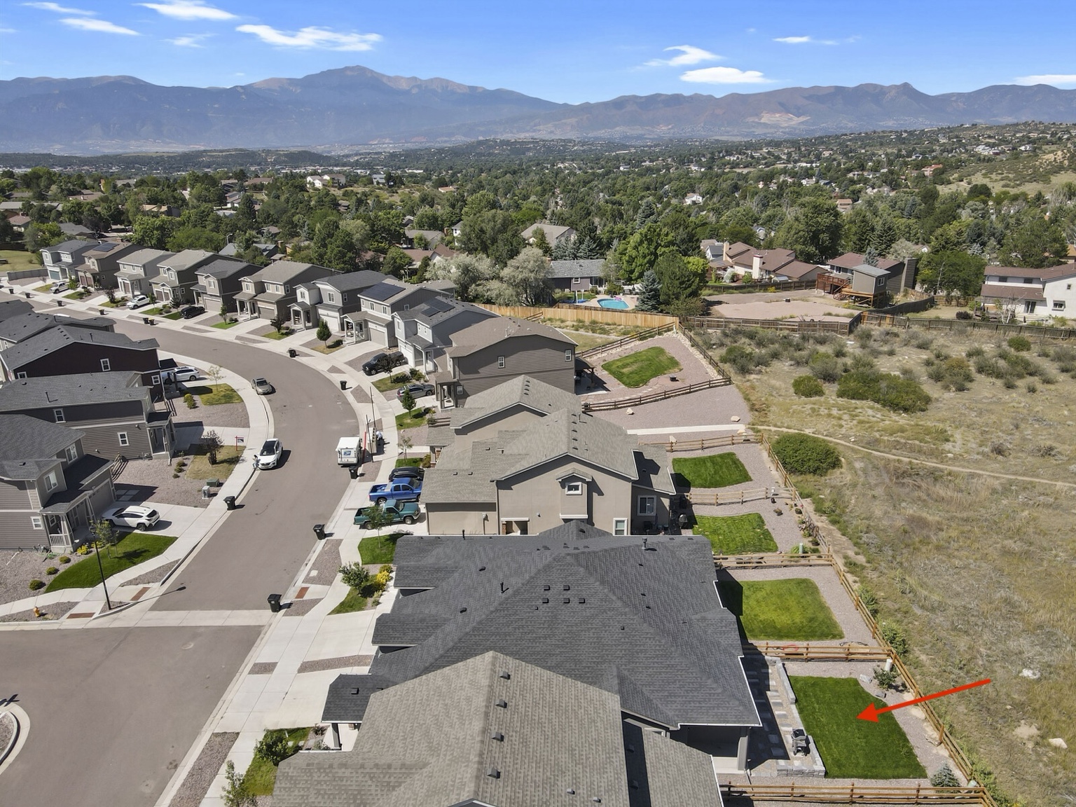 Sweeping mountain view above Heathland Terrace in Colorado Springs